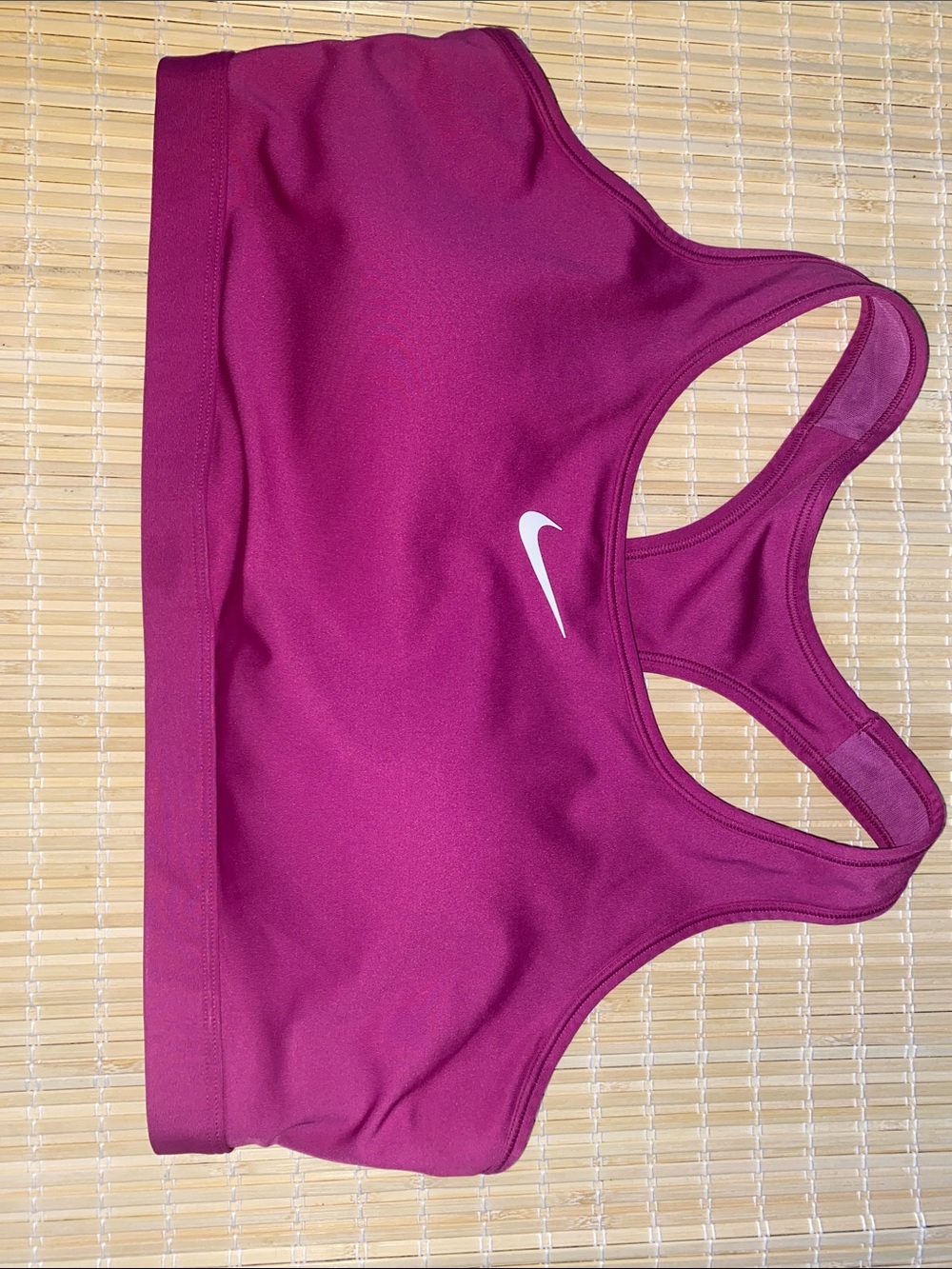 Nike Women's Raspberry Racerback Sports Bra with White Swoosh